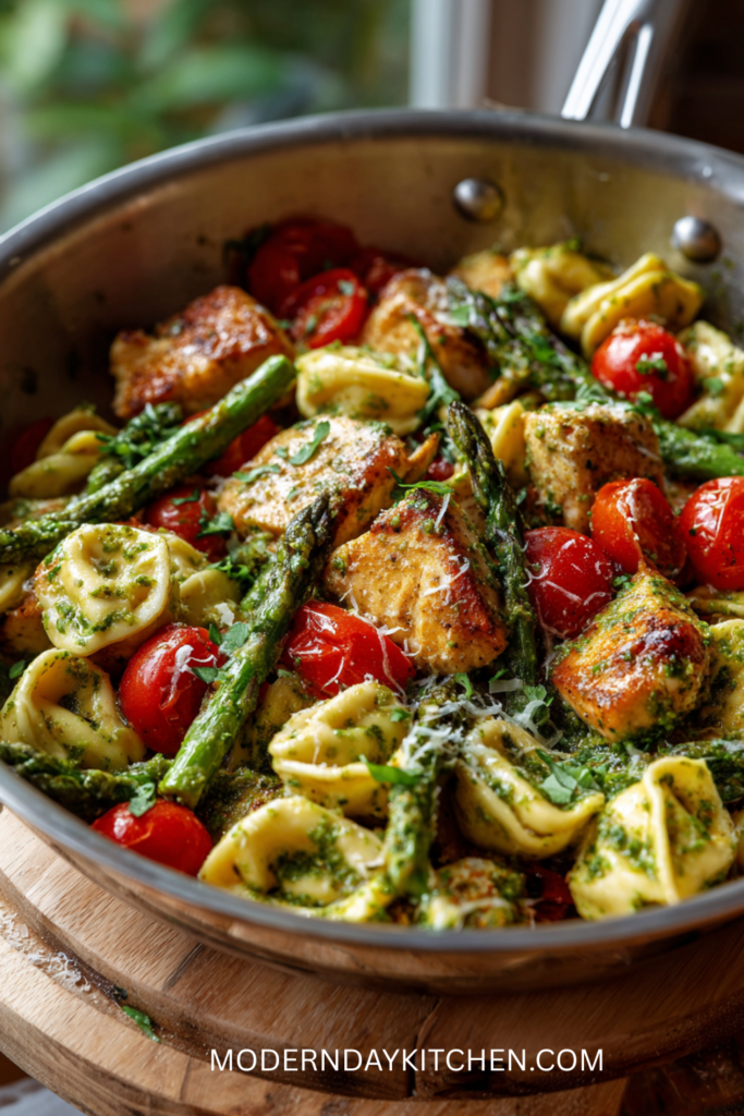 One Pan Pesto Chicken Tortellini with Asparagus and Tomatoes