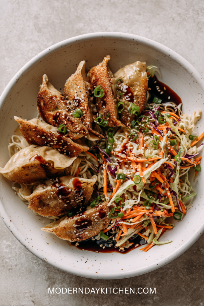 Potsticker Noodle Bowl with Pork and Cabbage Slaw